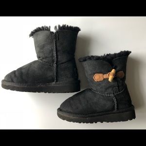 Ugg black boots with wooden button closure